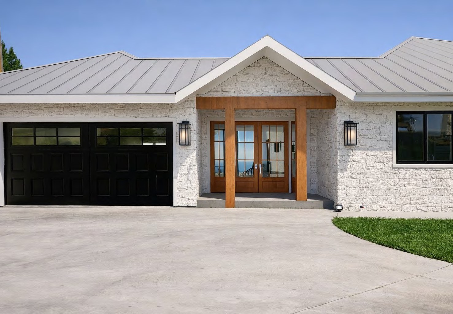 Hill Country custom home entry design visualization with stone exterior, black garage doors, wood posts, and metal roof